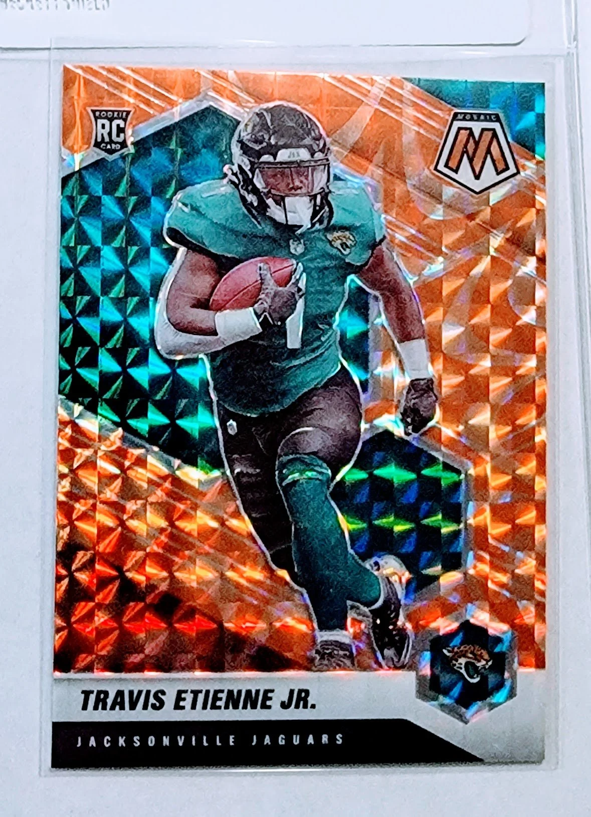 2021 Panini Mosaic Travis Etienne Jr Orange Rookie Refractor Jacksonville Jaguars Football Card AVM1