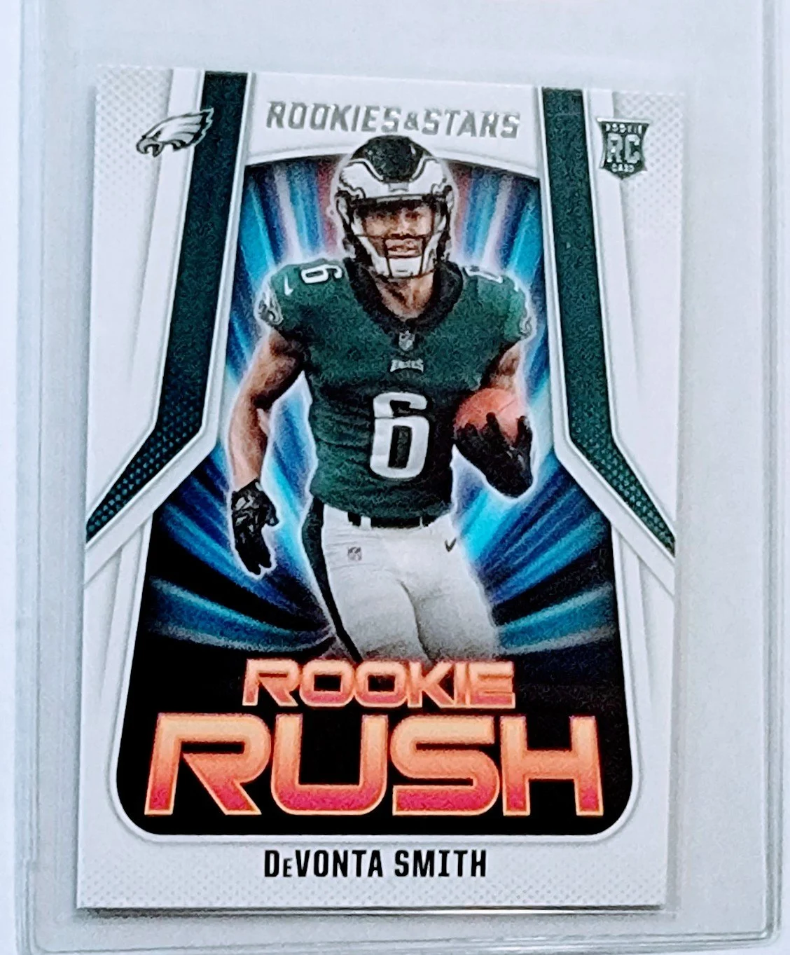 2021 Panini Rookies and Stars Devonta Smith Rookie Rush Philadelphia Eagles Football Card AVM1