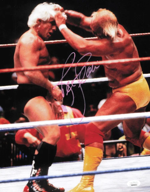 Ric Flair Autographed 11x14 Photo vs. Hulk Hogan JSA #WA036524